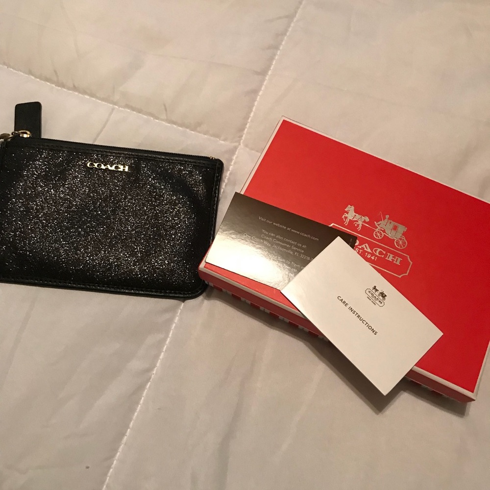 sparkly black coach wristlet